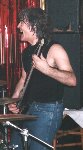 Tony on bass going for it at Fairford